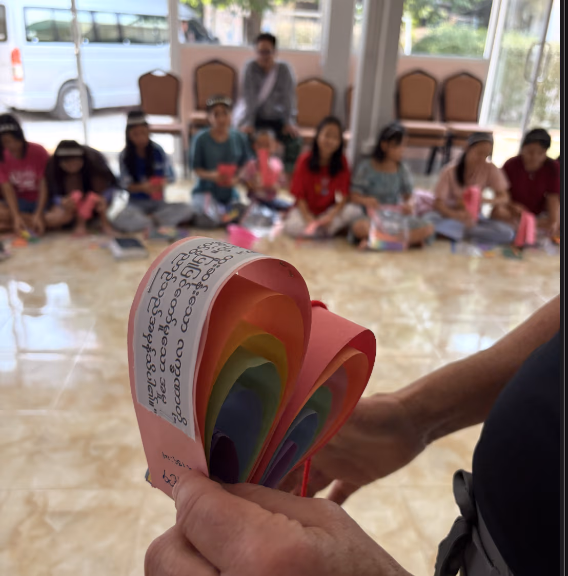 Girls working on their Identity Mobile heart strips